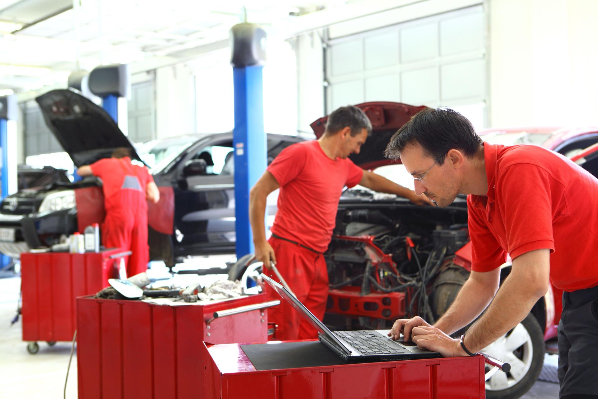 Car mechanics at work.